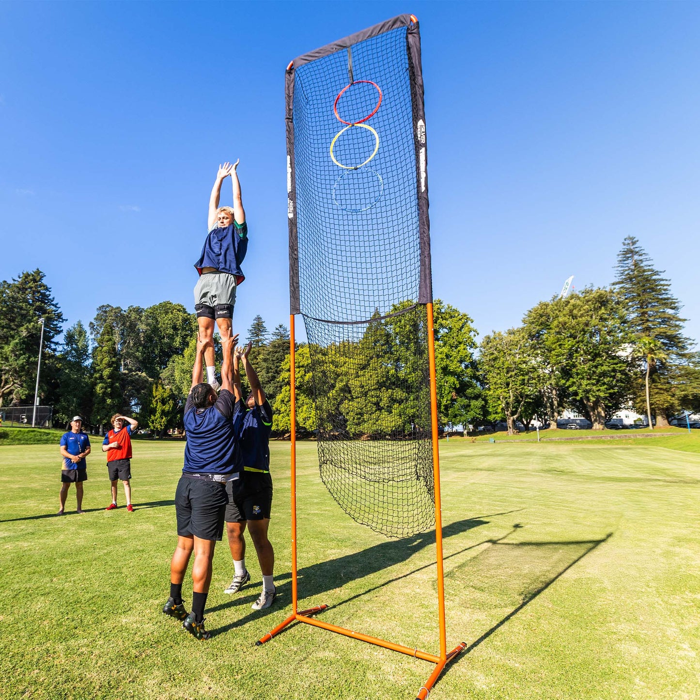 ThrowPro Lineout Target Throwing Net, lifestyle shot, lineout player being lifted right next to the target