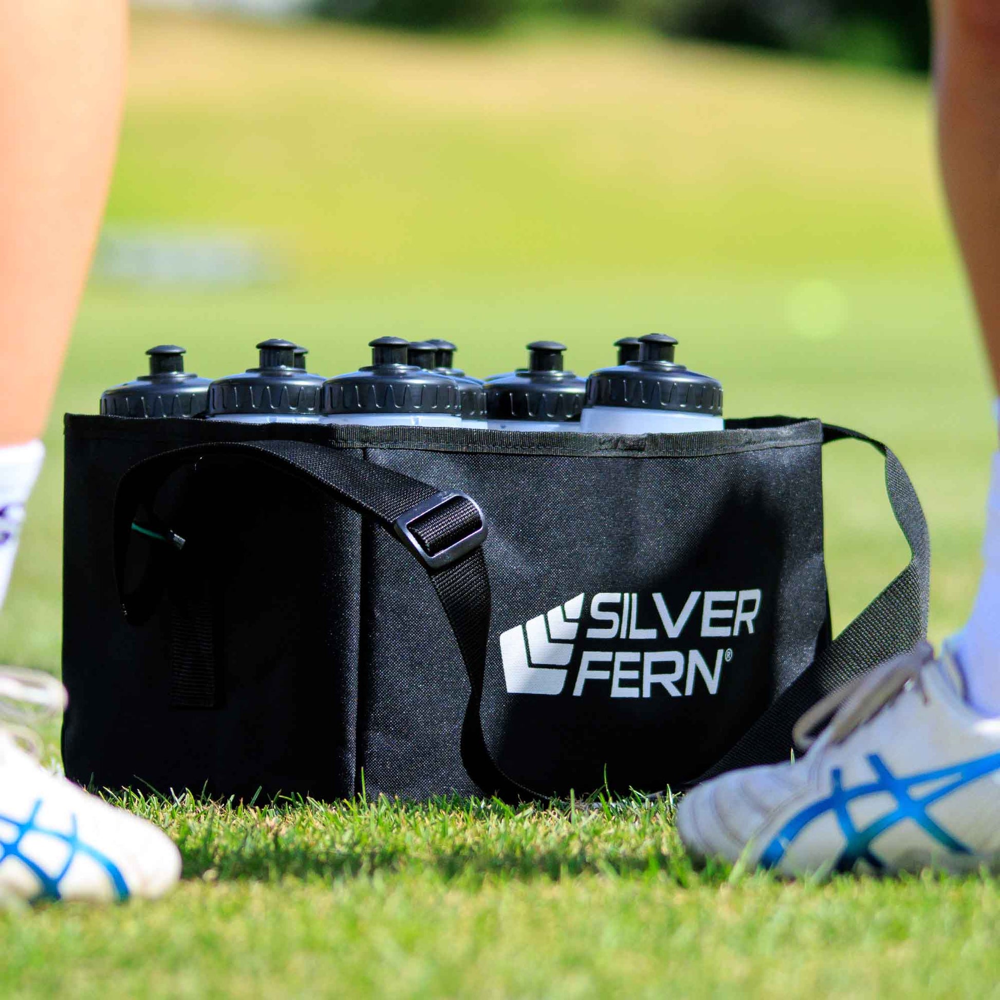 Silver Fern Fabric Drink Bottle Carrier, front, lifestyle.