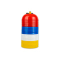 Multicolored cylindrical object with red, blue, white, and yellow segments on a white background