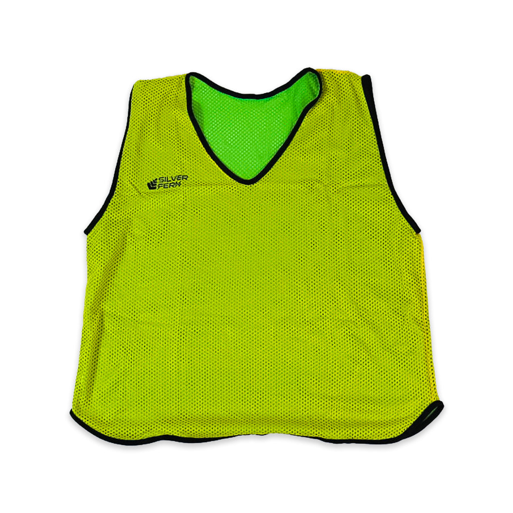 Yellow sports bib with green inner lining on a white background