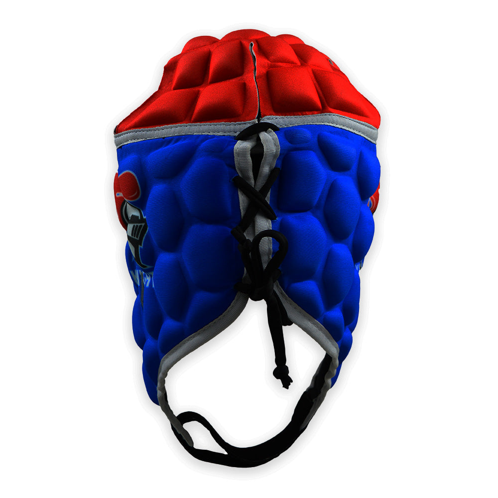 Red and blue helmet with a textured surface on a white background