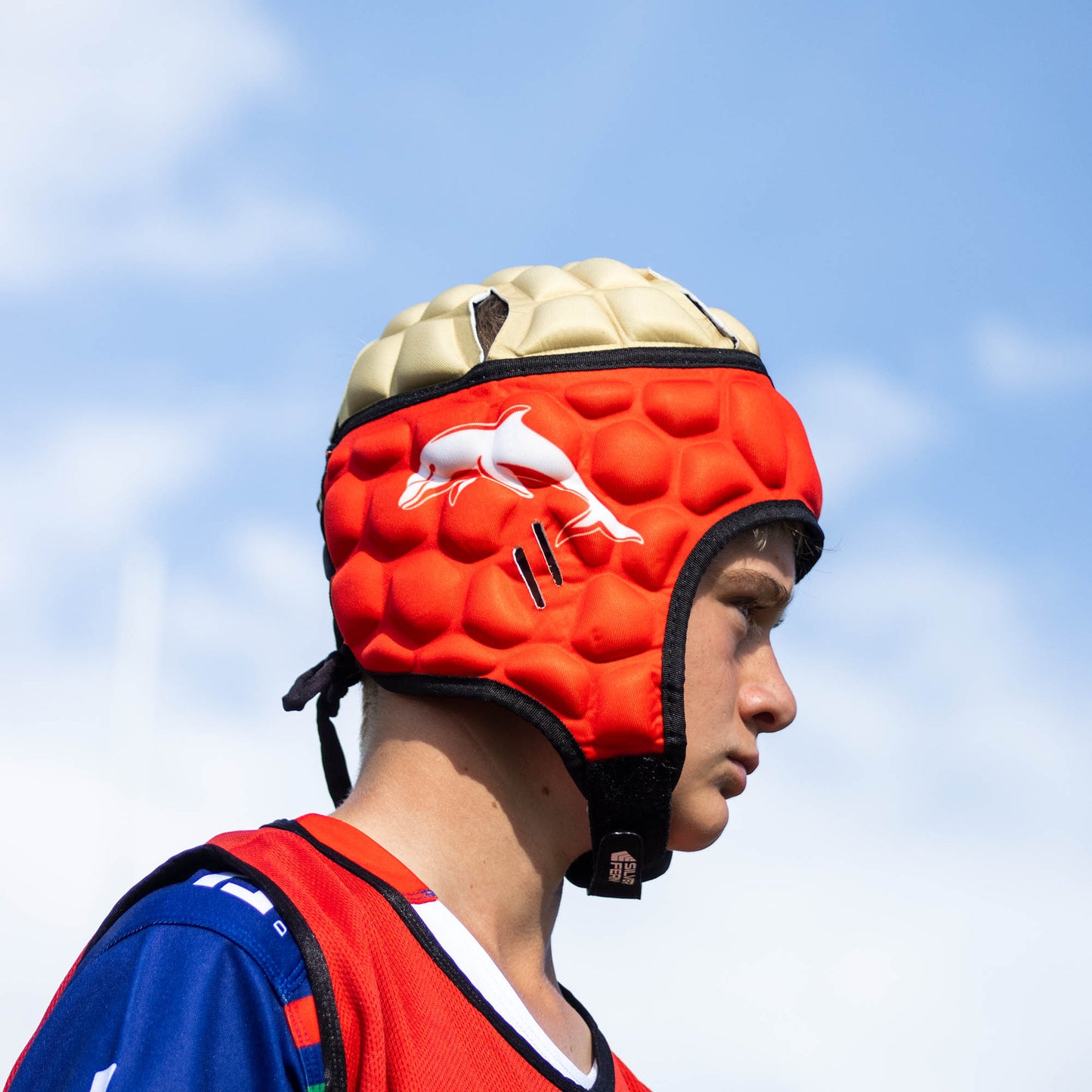 Official NRL Headgear, Dolphins, lifestyle image, side.