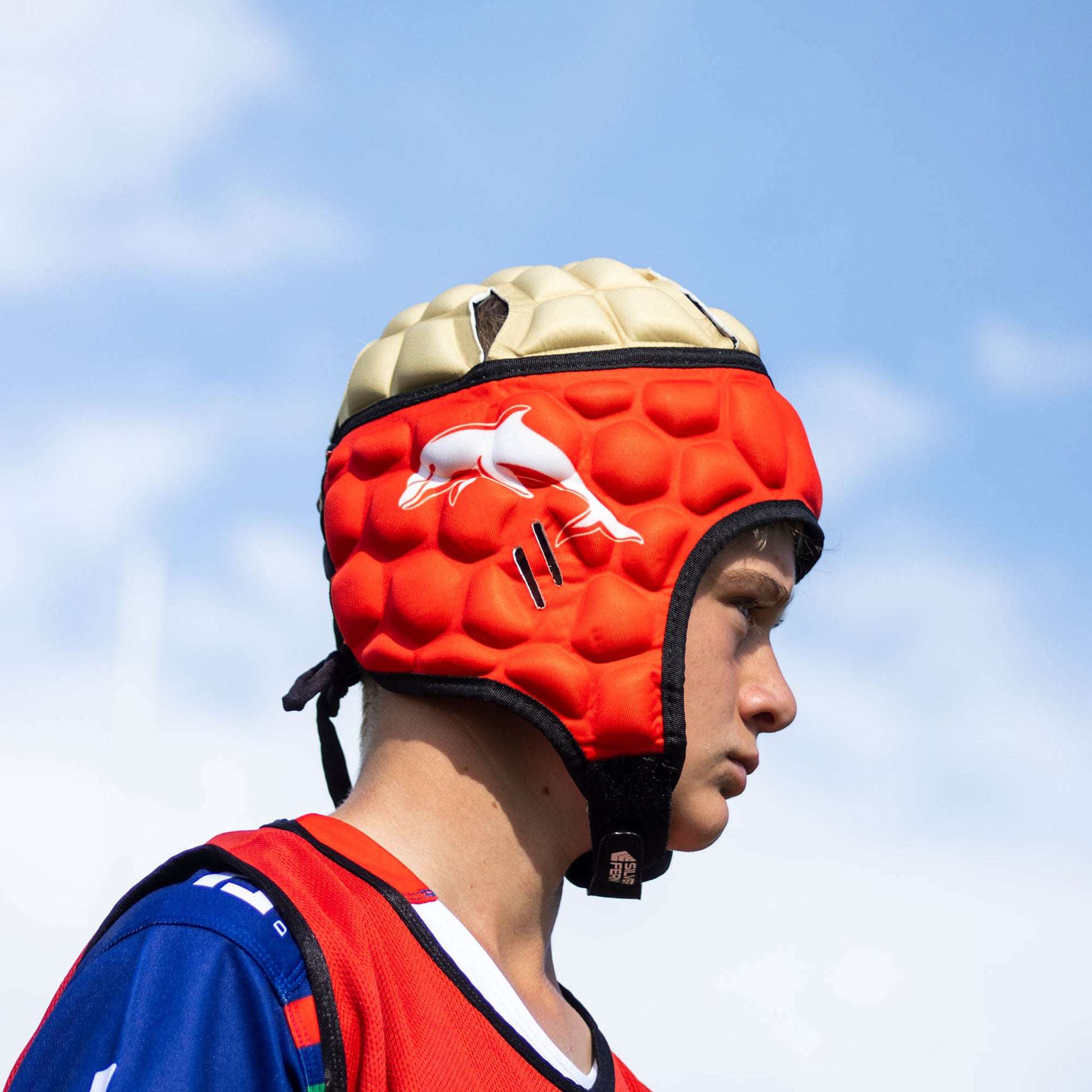 Official NRL Headgear, Dolphins, lifestyle image, side.