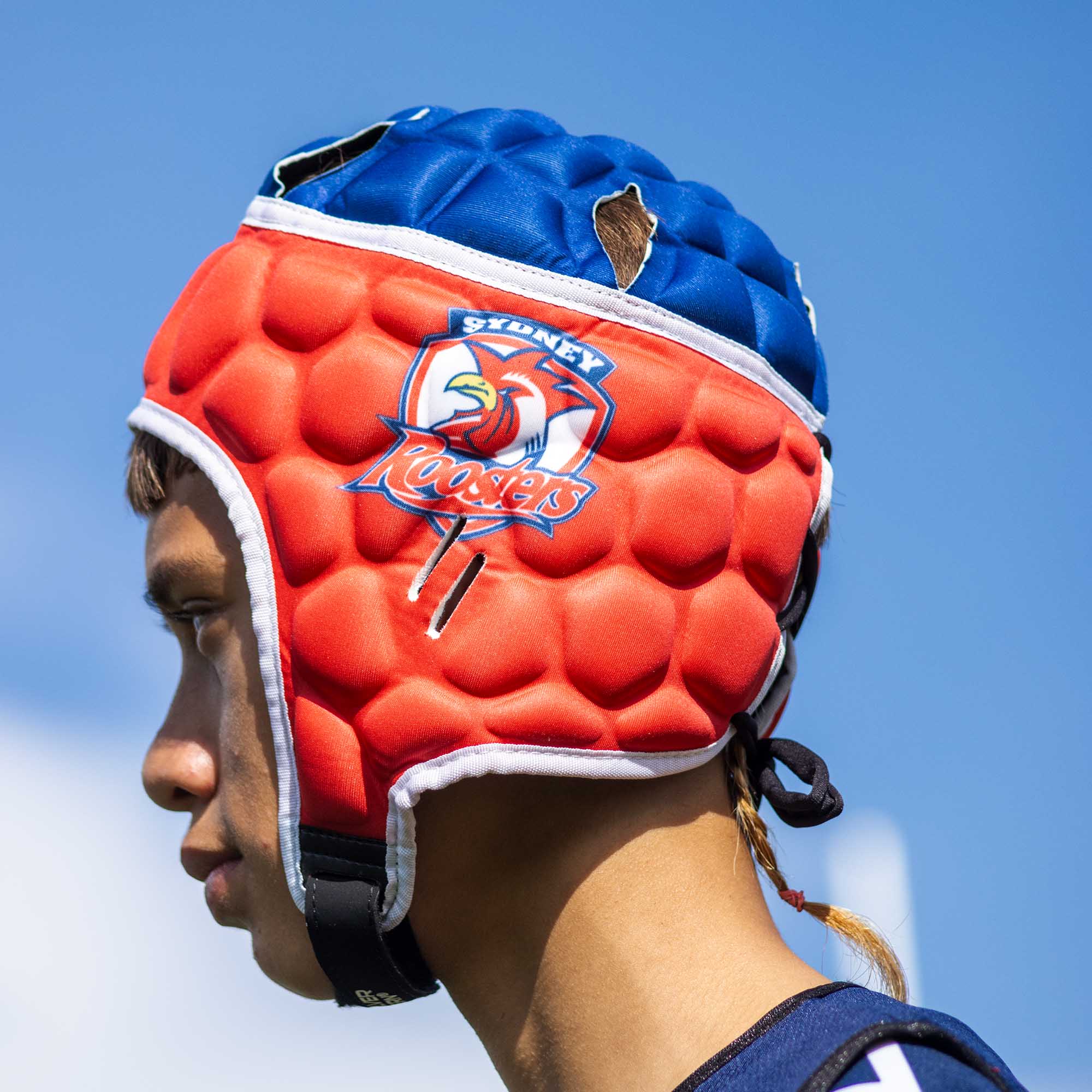 Official NRL Headgear, Sydney Roosters, lifestyle image, side.