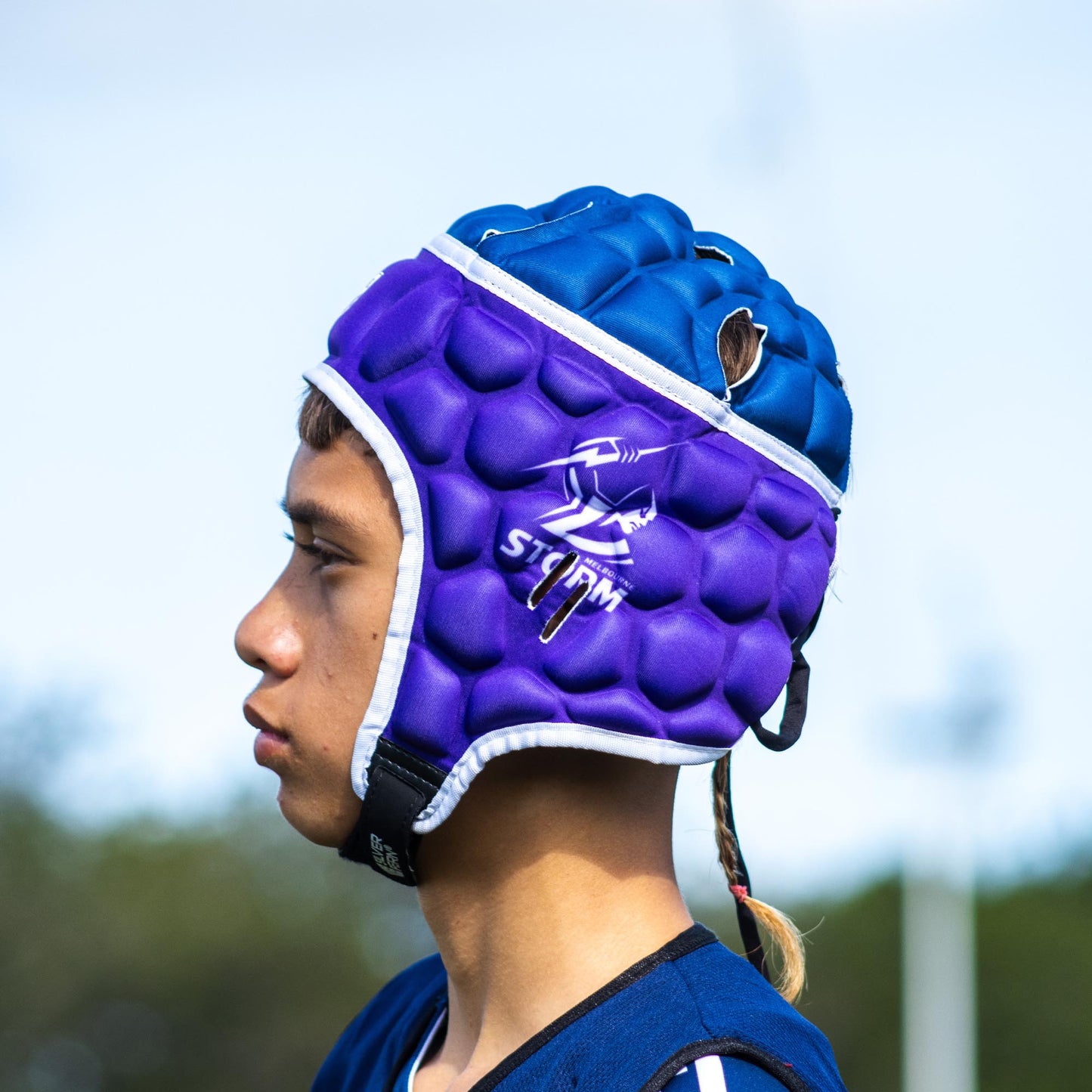 Official NRL Headgear, Melbourne Storm, lifestyle image, side.