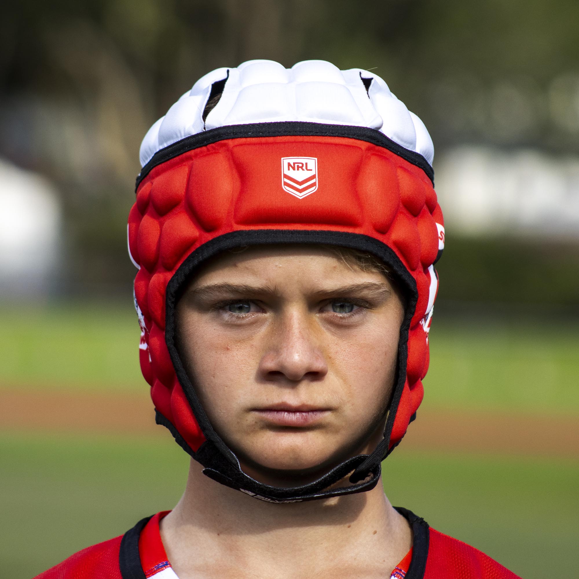 Official NRL Headgear, St. George Illawarra Dragons, lifestyle image, front.