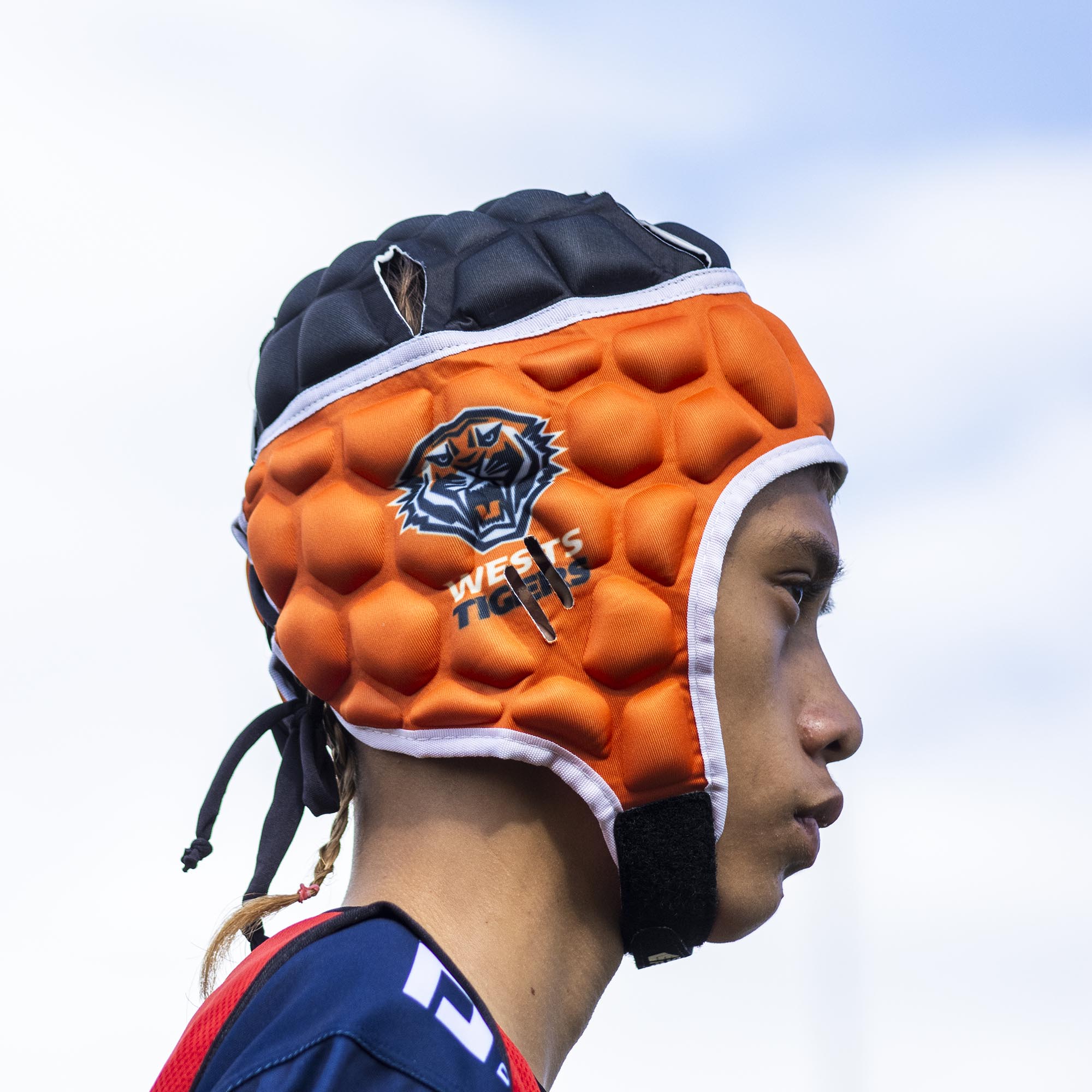 Official NRL Headgear, Wests Tigers, lifestyle image, side.