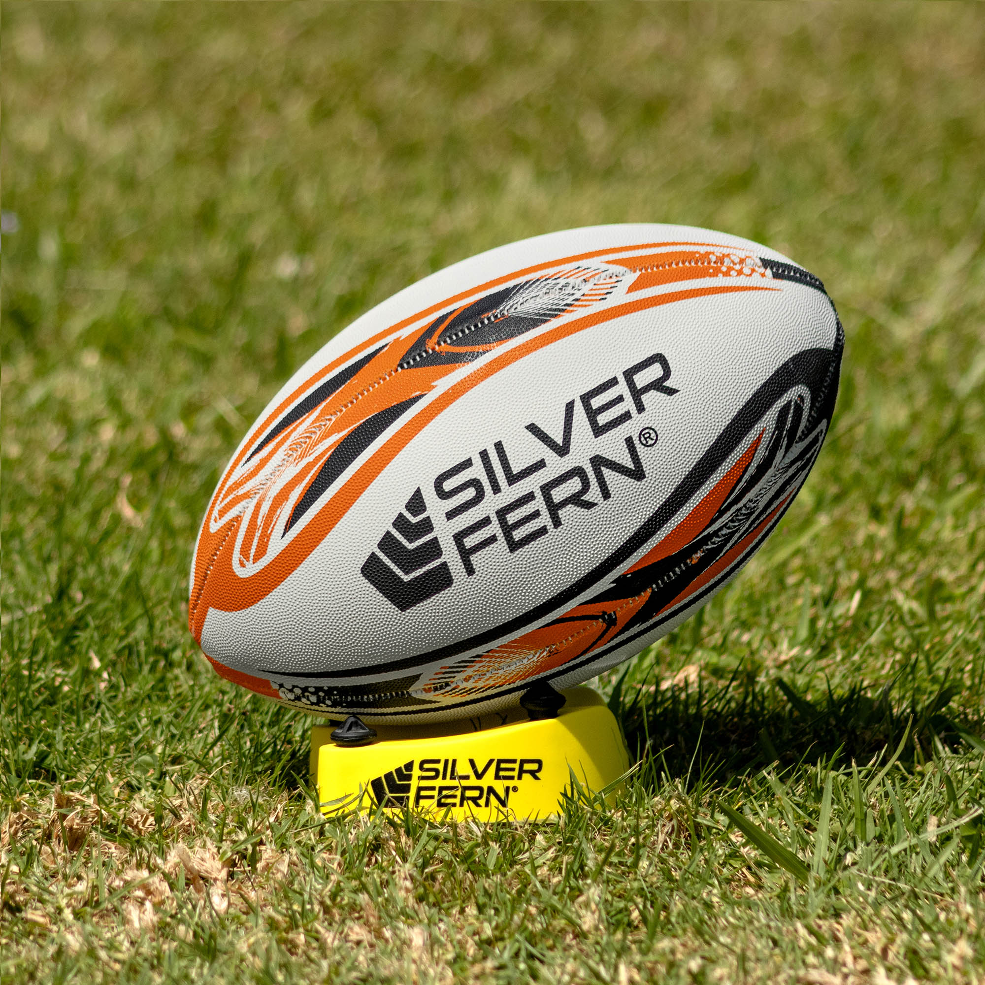 Silver Fern League Mini Trainer Size 3, Lifestyle shot, sitting on a kicking tee
