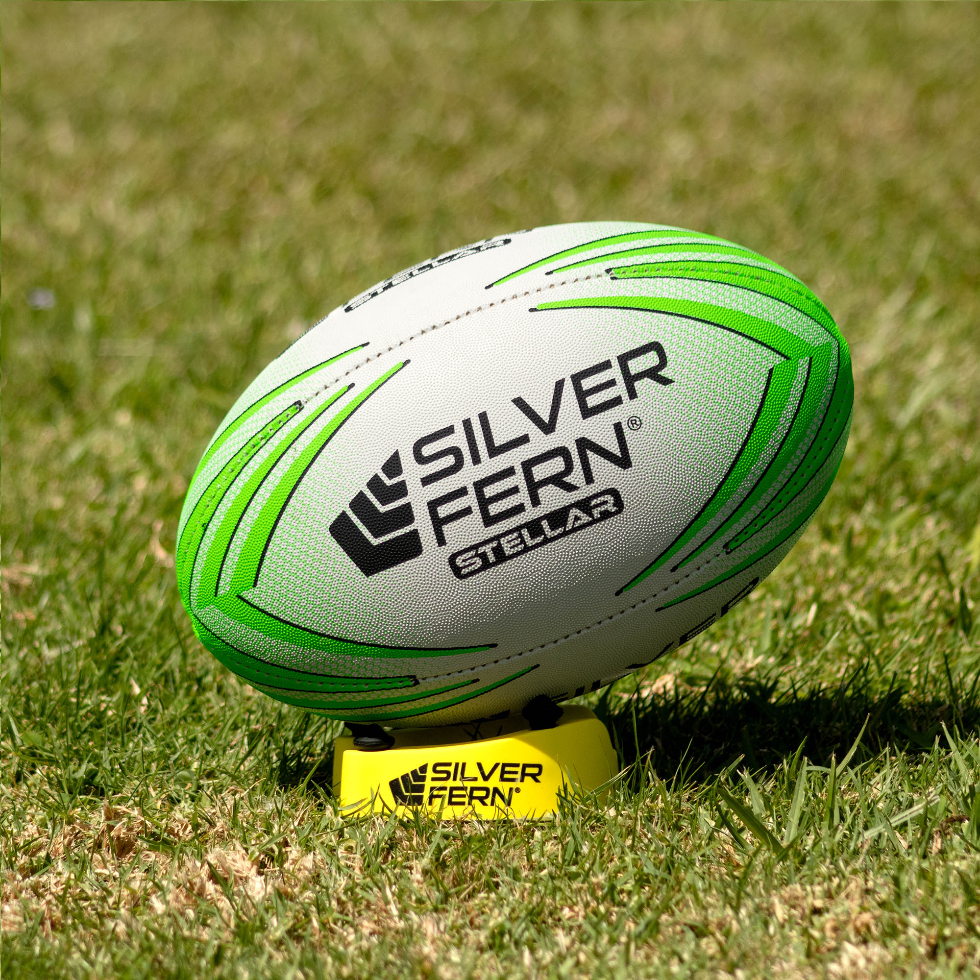 Silver Fern Stellar Premium Trainer Size 4, Lifestyle shot, sitting on a kicking tee