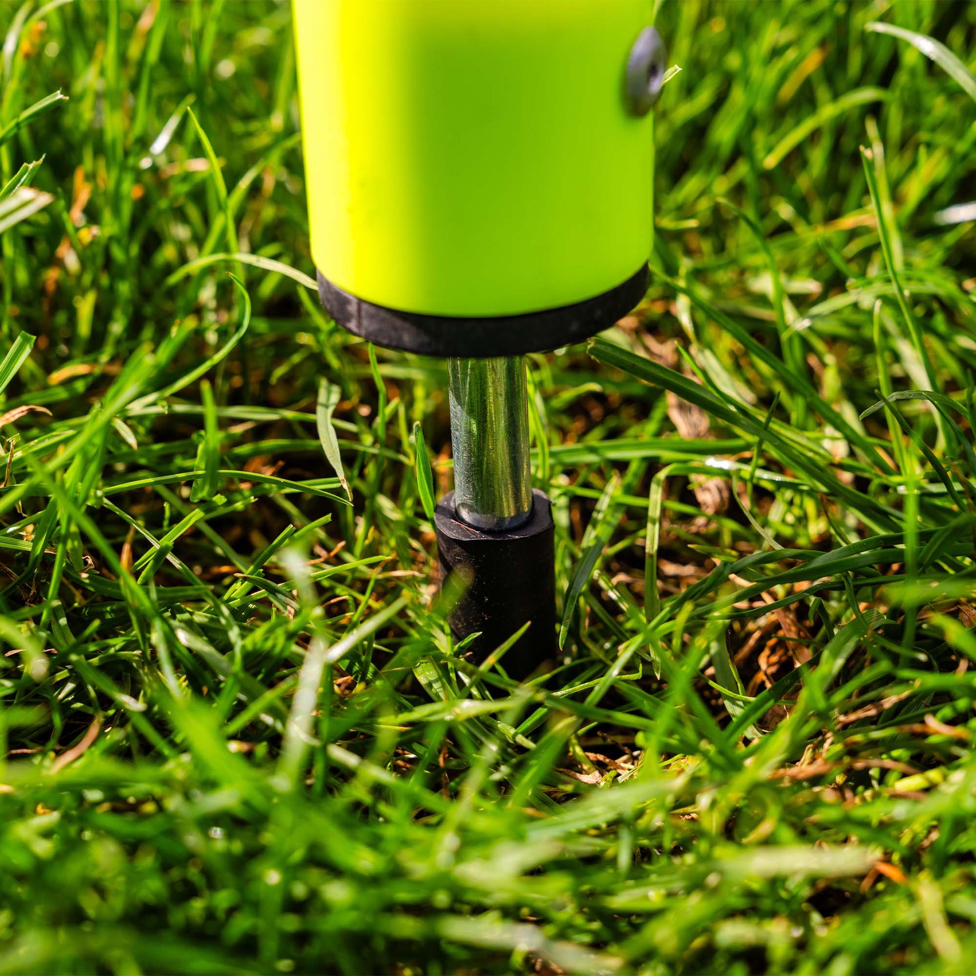 A close-up shot of a Telescopic Agility Pole, outdoor spike with rubber bottom.