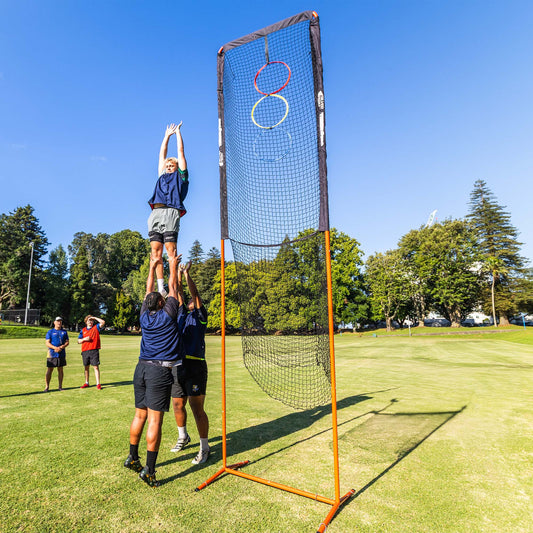 ThrowPro Lineout Target Throwing Net, lifestyle shot, lineout player being lifted right next to the target
