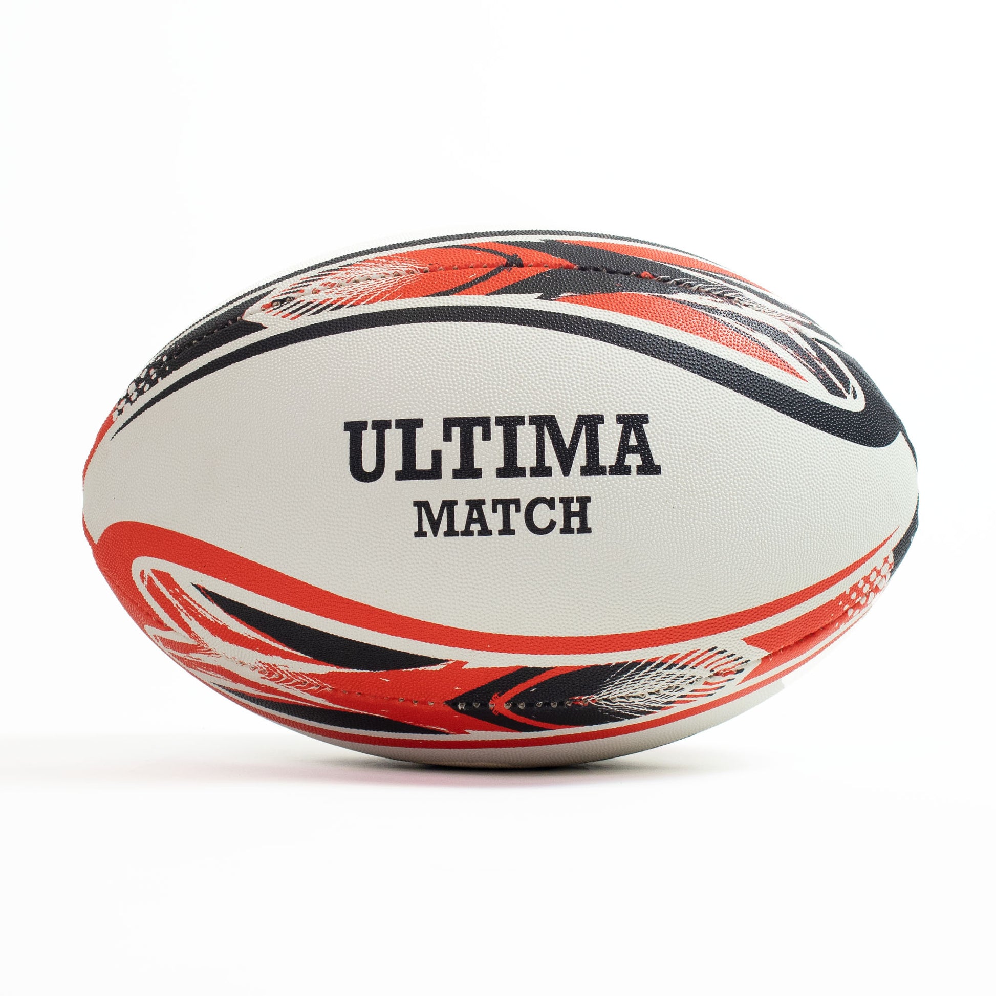 White rugby ball with red and black patterns and 'Ultima Match' branding on a white background